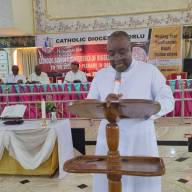 The ES presents Caritas Nigeria's report at the CBCN conference